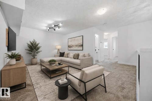 3234 Chernowski Way Sw, Edmonton, AB - Indoor Photo Showing Living Room
