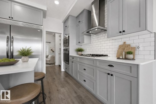 3234 Chernowski Way Sw, Edmonton, AB - Indoor Photo Showing Kitchen With Upgraded Kitchen