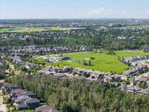 Residential community with expansive green spaces and dense tree coverage - 2043 Cameron Ravine Way Nw, Edmonton, AB - Outdoor With View