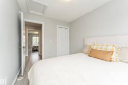 Neutral wall paint complementing wood-finish flooring - 