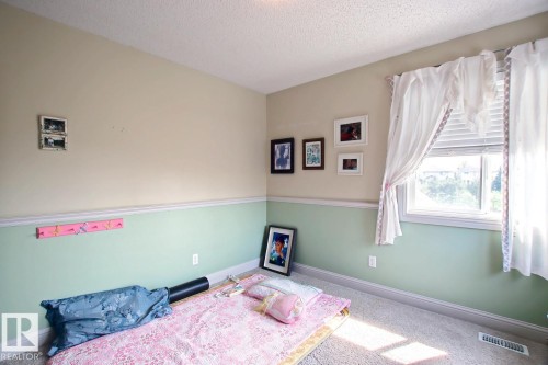 6175 Stinson Way Nw, Edmonton, AB - Indoor Photo Showing Bedroom