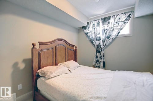 6175 Stinson Way Nw, Edmonton, AB - Indoor Photo Showing Bedroom