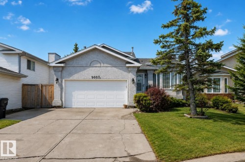 Attached two-car garage with a concrete driveway - 9007 169 Avenue Nw, Edmonton, AB - Outdoor