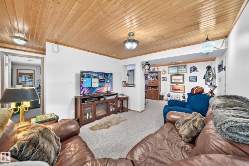 Wood-paneled ceiling with recessed lighting - 13069 37 Street Nw, Edmonton, AB - Indoor