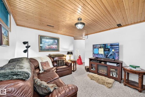 Wood-paneled ceiling with recessed lighting - 13069 37 Street Nw, Edmonton, AB - Indoor