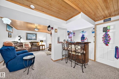 Wood-plank ceiling, white walls, and neutral-toned carpeting - 13069 37 Street Nw, Edmonton, AB - Indoor