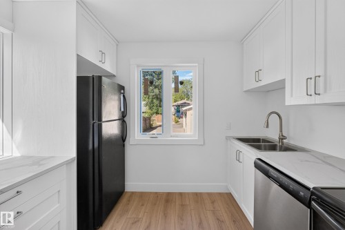 12306 95 Street Nw, Edmonton, AB - Indoor Photo Showing Kitchen With Double Sink