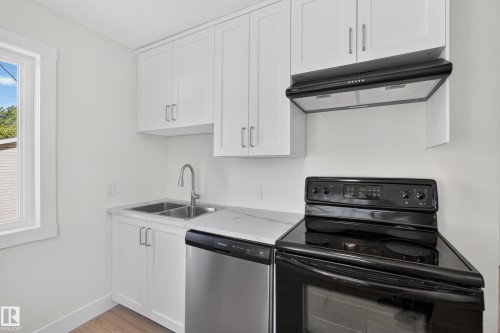 12306 95 Street Nw, Edmonton, AB - Indoor Photo Showing Kitchen With Double Sink