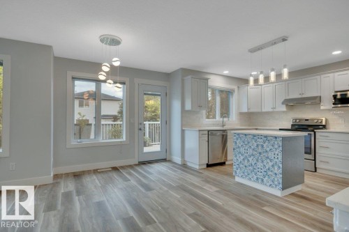 27 Birchmont Drive, Leduc, AB - Indoor Photo Showing Kitchen With Upgraded Kitchen