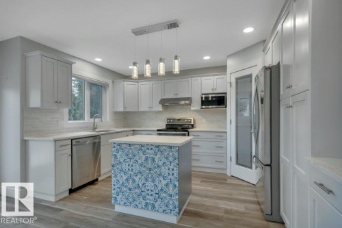 27 Birchmont Drive, Leduc, AB - Indoor Photo Showing Kitchen With Upgraded Kitchen