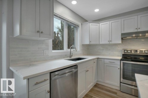 27 Birchmont Drive, Leduc, AB - Indoor Photo Showing Kitchen With Double Sink