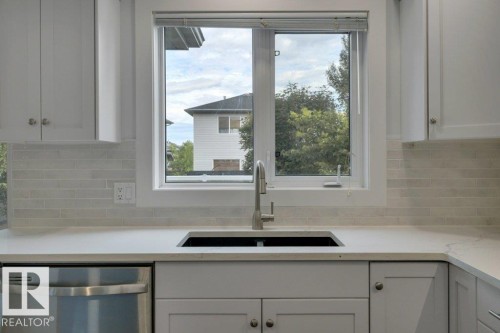 27 Birchmont Drive, Leduc, AB - Indoor Photo Showing Kitchen With Double Sink