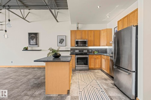 #205 10265 107 St Nw, Edmonton, AB - Indoor Photo Showing Kitchen With Stainless Steel Kitchen