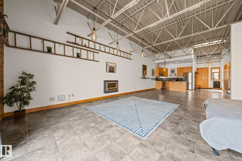 #205 10265 107 St Nw, Edmonton, AB - Indoor Photo Showing Other Room With Fireplace