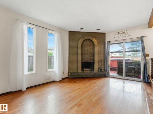 11056 166 Avenue Nw, Edmonton, AB - Indoor Photo Showing Living Room With Fireplace