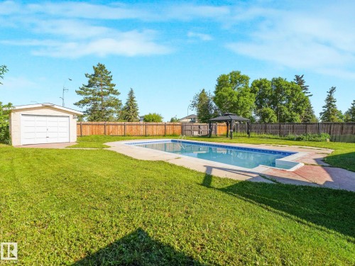 11056 166 Avenue Nw, Edmonton, AB - Outdoor With In Ground Pool With Backyard