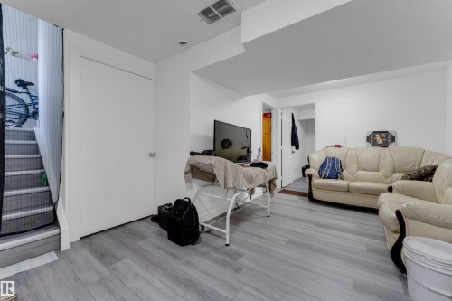 5608 17 Avenue Sw, Edmonton, AB - Indoor Photo Showing Living Room