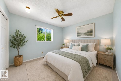 **VIRTUALLY STAGED** - 4 Blue Quill Crescent Nw, Edmonton, AB - Indoor Photo Showing Bedroom