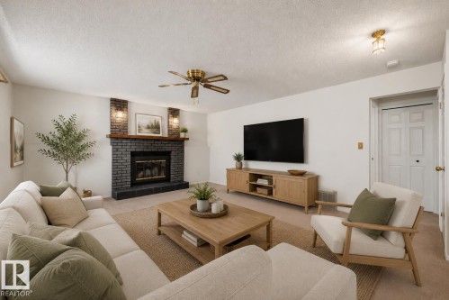 **VIRTUALLY STAGED** - 4 Blue Quill Crescent Nw, Edmonton, AB - Indoor Photo Showing Living Room With Fireplace