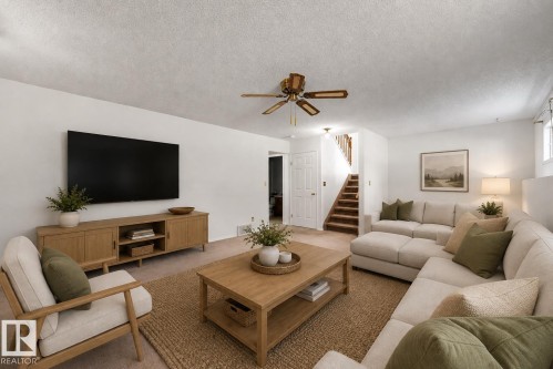 **VIRTUALLY STAGED** - 4 Blue Quill Crescent Nw, Edmonton, AB - Indoor Photo Showing Living Room