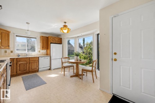 **VIRTUALLY STAGED** - 4 Blue Quill Crescent Nw, Edmonton, AB - Indoor Photo Showing Kitchen With Double Sink