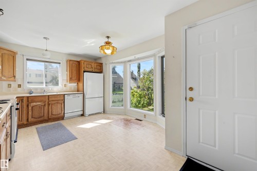 4 Blue Quill Crescent Nw, Edmonton, AB - Indoor Photo Showing Kitchen With Double Sink