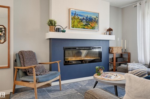 #126 2905 141 St Sw, Edmonton, AB - Indoor Photo Showing Living Room With Fireplace