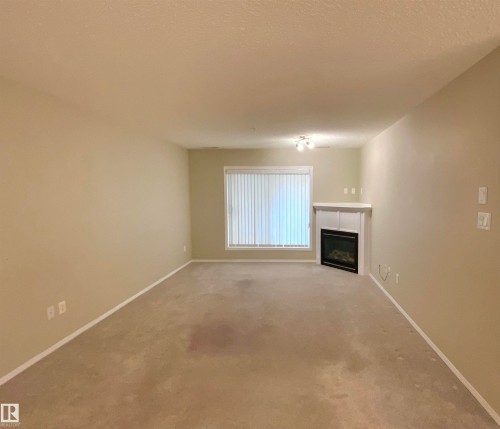 #140 16035 132 St Nw, Edmonton, AB - Indoor With Fireplace