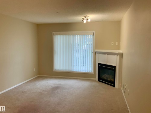 #140 16035 132 St Nw, Edmonton, AB - Indoor With Fireplace
