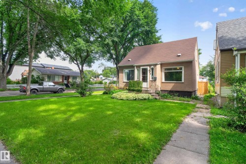 Single-story residence featuring a gabled roof and stucco exterior - 11549 88 Street Nw, Edmonton, AB - Outdoor