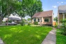 Single-story residence featuring a gabled roof and stucco exterior - 11549 88 Street Nw, Edmonton, AB  - Outdoor 