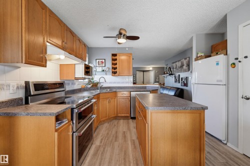 14903 128 Street Nw, Edmonton, AB - Indoor Photo Showing Kitchen With Double Sink