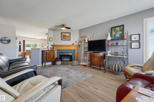 14903 128 Street Nw, Edmonton, AB - Indoor Photo Showing Living Room With Fireplace
