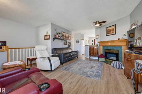 14903 128 Street Nw, Edmonton, AB - Indoor Photo Showing Living Room With Fireplace