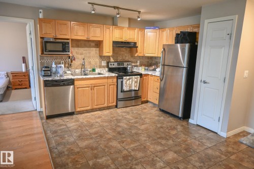 #316 5005 165 Av Nw, Edmonton, AB - Indoor Photo Showing Kitchen With Stainless Steel Kitchen With Double Sink