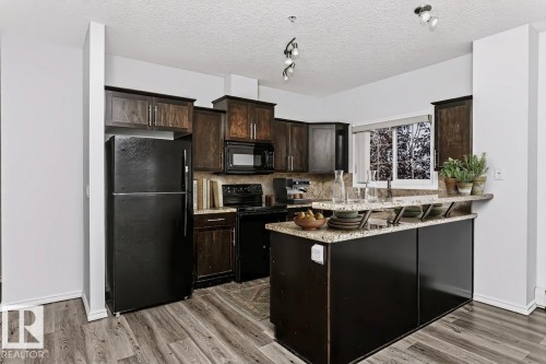 #341 263 Macewan Rd Sw, Edmonton, AB - Indoor Photo Showing Kitchen