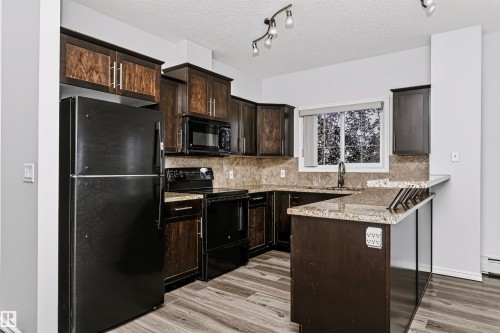 #341 263 Macewan Rd Sw, Edmonton, AB - Indoor Photo Showing Kitchen
