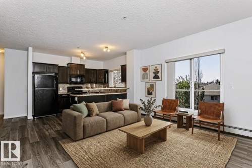 virtually staged - #341 263 Macewan Rd Sw, Edmonton, AB - Indoor Photo Showing Living Room