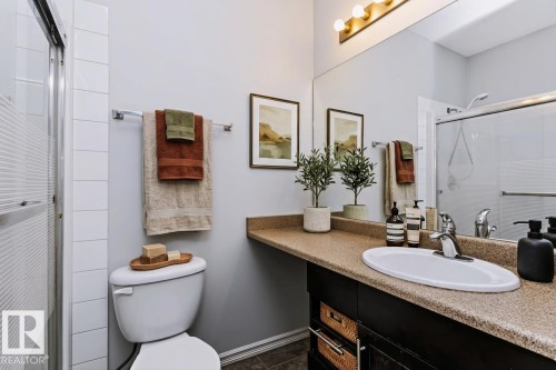 virtually staged - #341 263 Macewan Rd Sw, Edmonton, AB - Indoor Photo Showing Bathroom