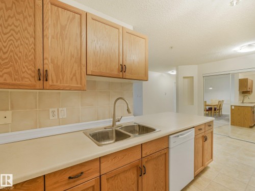 #114 10511 42 Av Nw, Edmonton, AB - Indoor Photo Showing Kitchen With Double Sink