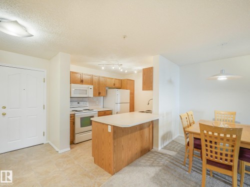 #114 10511 42 Av Nw, Edmonton, AB - Indoor Photo Showing Kitchen With Double Sink