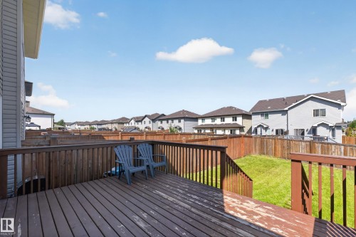 Expansive wooden deck with a fenced backyard - 1404 25 Avenue Nw, Edmonton, AB - Outdoor With Deck Patio Veranda With Exterior