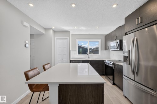 749 Southfork Drive, Leduc, AB - Indoor Photo Showing Kitchen With Upgraded Kitchen