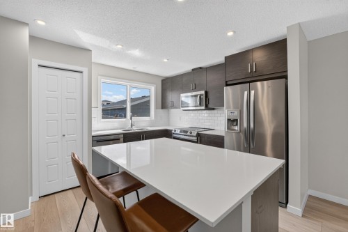 749 Southfork Drive, Leduc, AB - Indoor Photo Showing Kitchen With Upgraded Kitchen