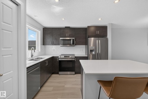 749 Southfork Drive, Leduc, AB - Indoor Photo Showing Kitchen With Double Sink With Upgraded Kitchen