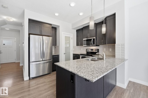 1793 Keene Crescent Sw, Edmonton, AB - Indoor Photo Showing Kitchen With Double Sink With Upgraded Kitchen