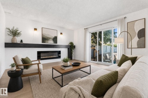 10612 10 Avenue Nw, Edmonton, AB - Indoor Photo Showing Living Room With Fireplace