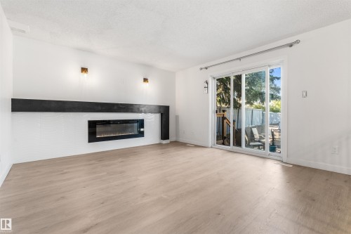 10612 10 Avenue Nw, Edmonton, AB - Indoor Photo Showing Living Room With Fireplace