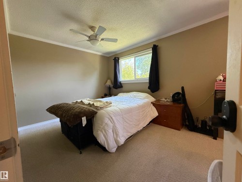 153 Maple Crescent, Wetaskiwin, AB - Indoor Photo Showing Bedroom