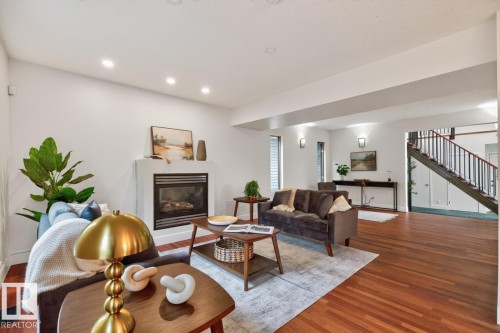 8860 93 Street Nw, Edmonton, AB - Indoor Photo Showing Living Room With Fireplace